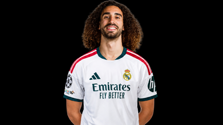 Marc Cucurella wearing his Real Madrid jersey after the contract is finalized
