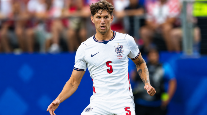 Description: John Stones playing for England during the World Cup